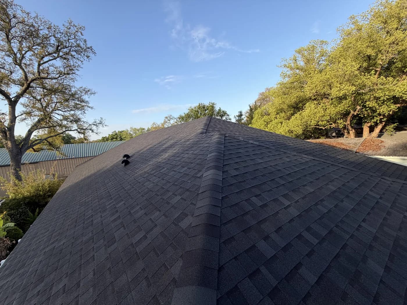 New charcoal shingle hip roof
